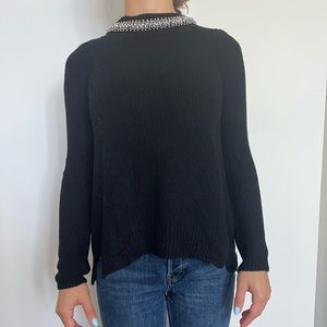 Beautiful black sweater with embellished neck